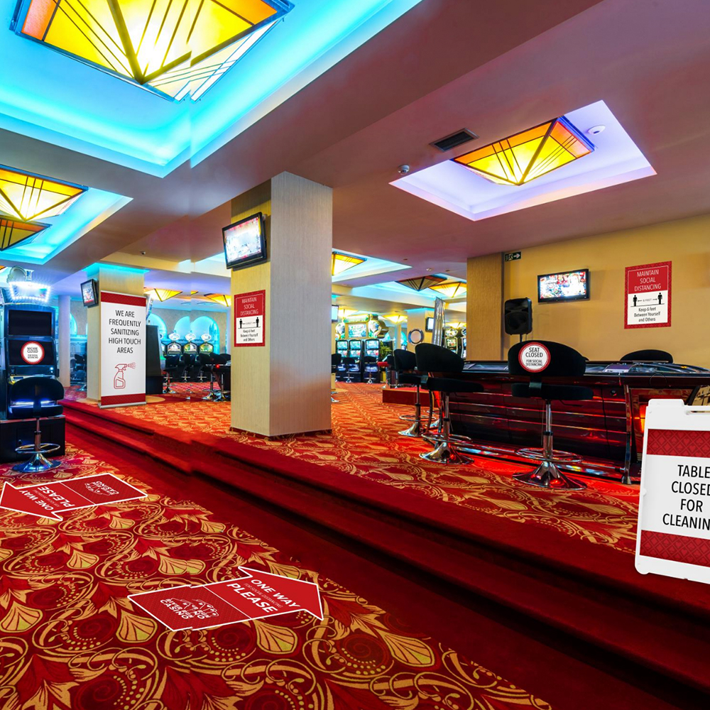Casino lobby with social distancing and restricted access signage