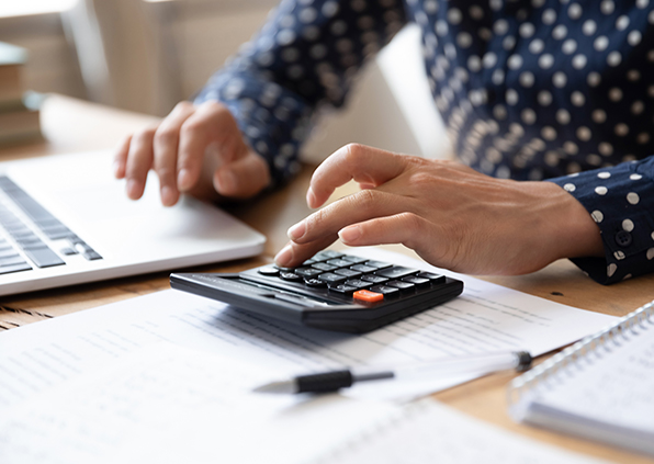 Woman using a calculator