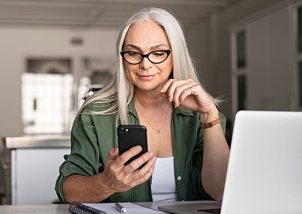 A woman browsing her cell phone