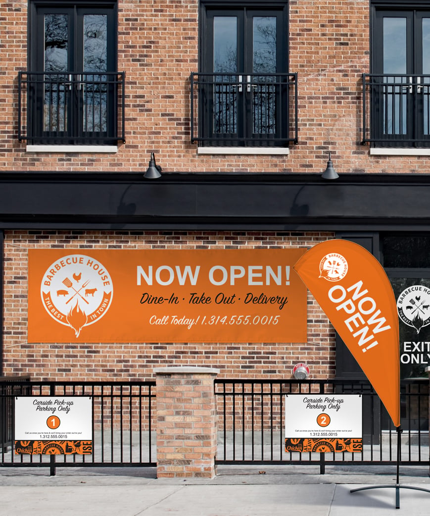 retail storefront with now open fabric signage