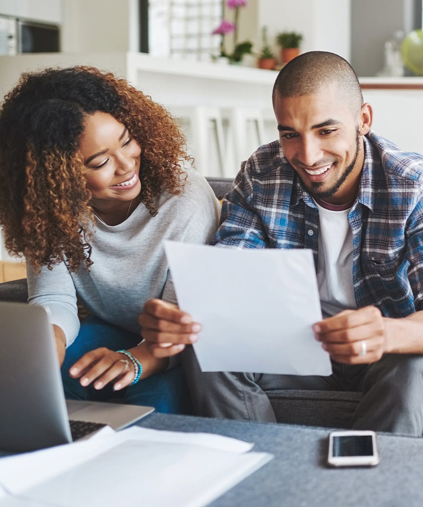 young couple reviewing insurance program